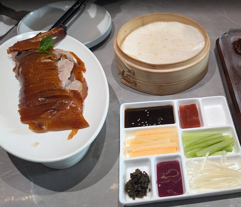 Pato laqueado en Beijing Da Dong, Pekín, China